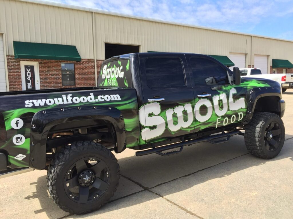 Swoul Food commercial truck wrap with website and social media graphics on rear bed panel