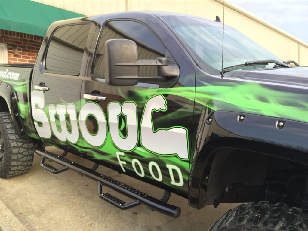Swoul Food lettering and 3M vehicle wrap graphics across Chevy Silverado doors