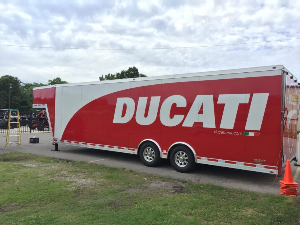 Vehicle wraps Birmingham AL: Ducati cargo trailer wrap installed by Black Diamond Designs in Homewood