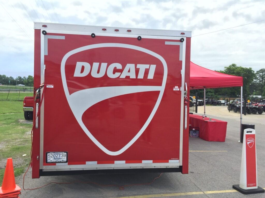 Ducati shield logo on rear doors of custom wrapped cargo trailer in Homewood, Alabama