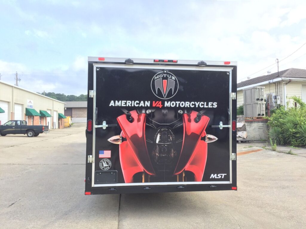 Rear cargo doors of the Motus trailer with American V4 Motorcycles branding