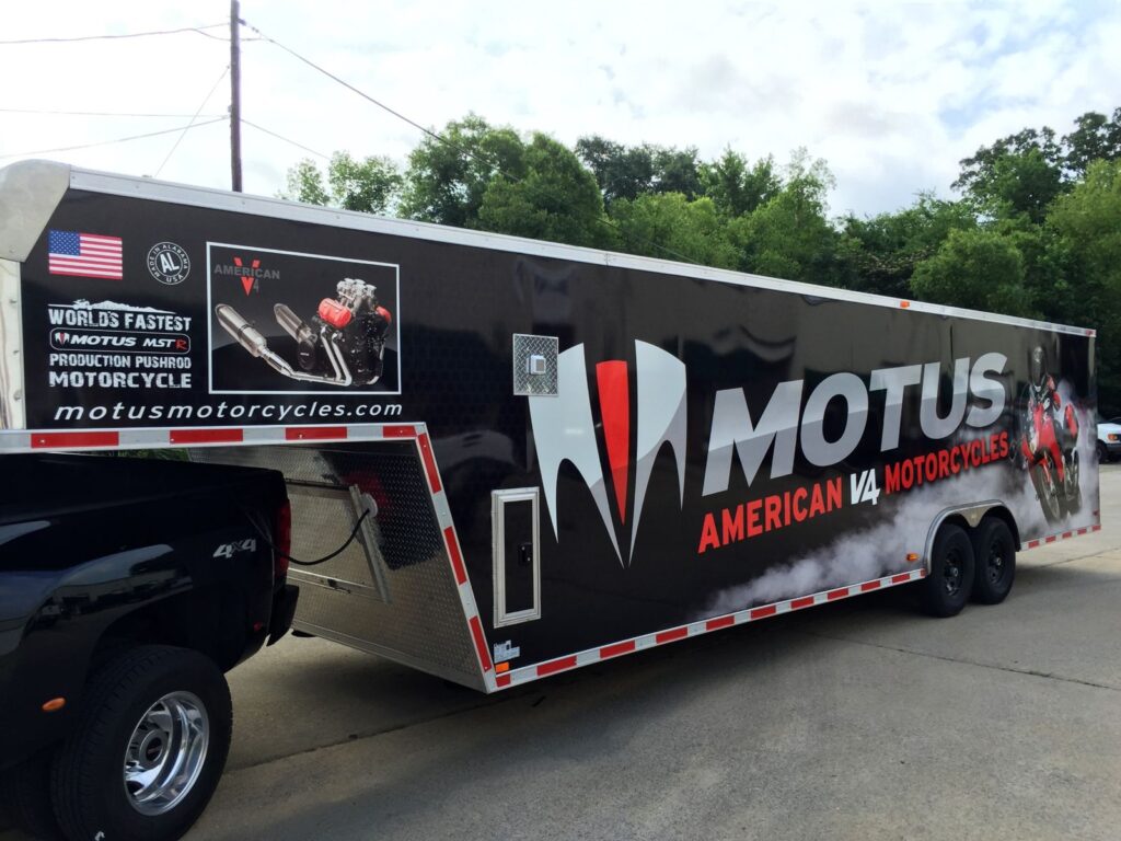 Motus Motorcycles trailer wrap: driver side of the gooseneck cargo trailer with MOTUS American V4 Motorcycles graphics