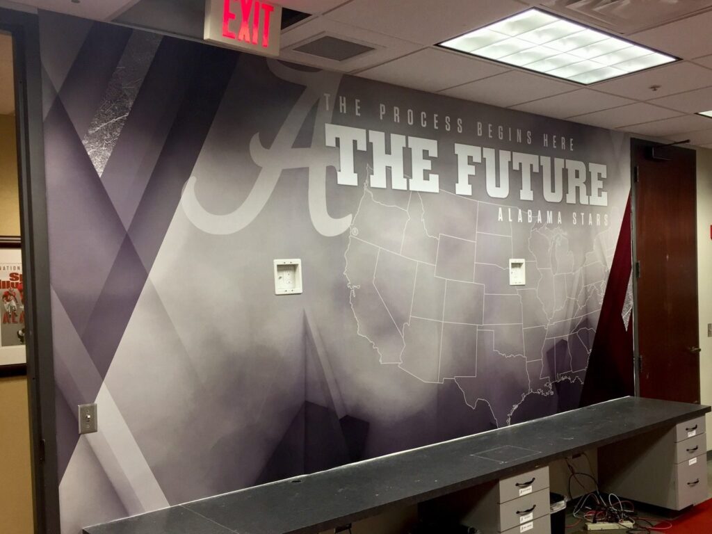University of Alabama graphics: recruiting room wall wrap with US map, large Alabama script A, and The Process Begins Here The Future Alabama Stars typography
