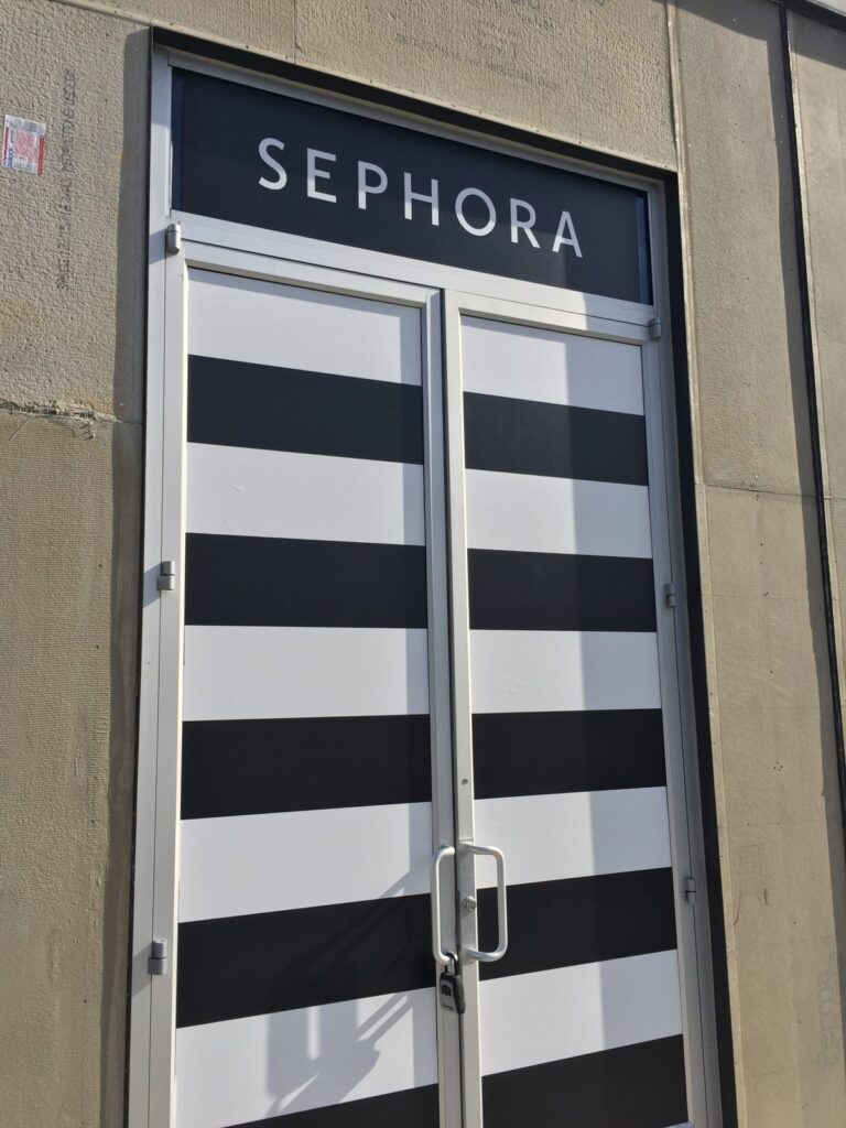 Sephora black-and-white striped glass entrance door graphics installed by Black Diamond Designs in Buckhead Atlanta.