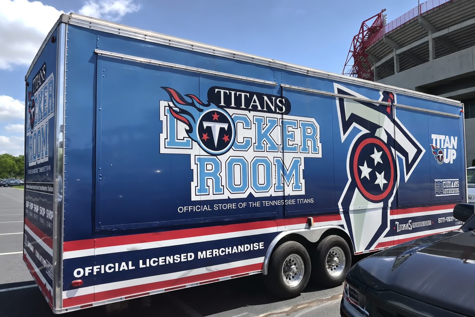 Tennessee Titans Locker Room cargo trailer wrap outside Nissan Stadium Nashville