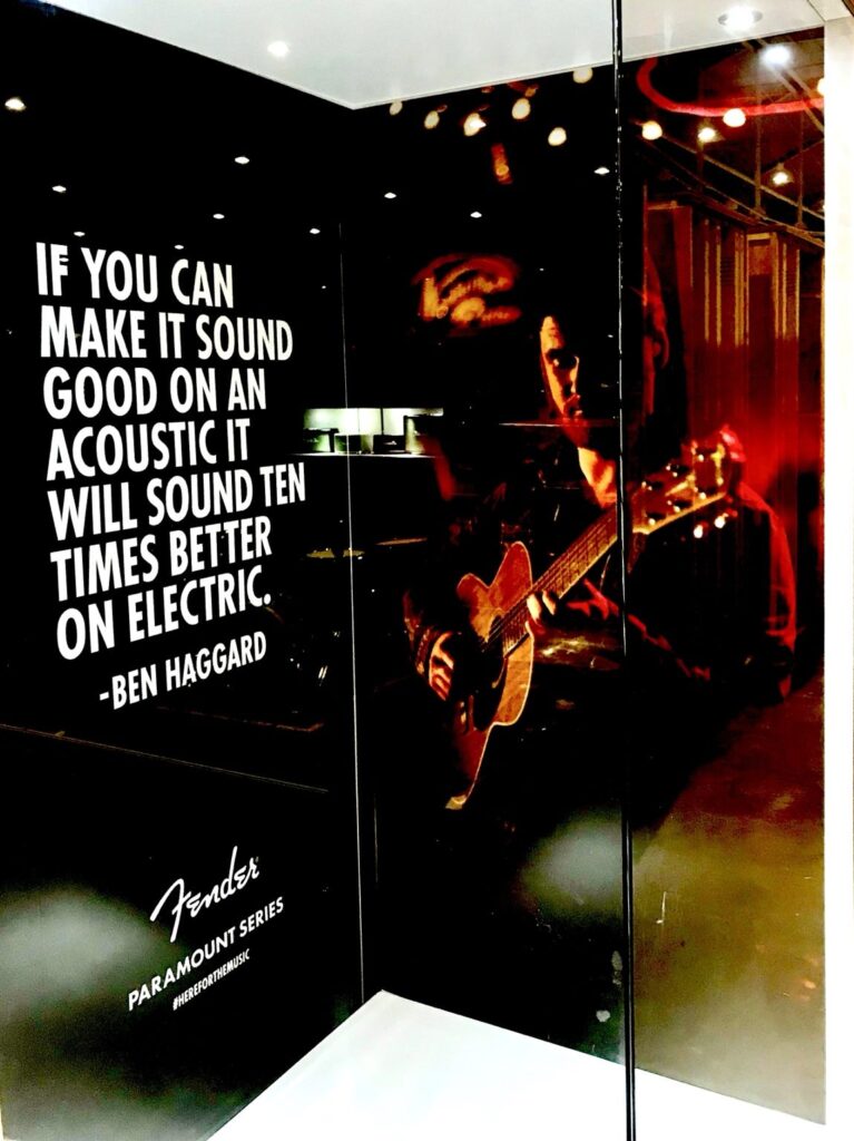 Fender Paramount Series black-and-red exhibition graphics with a Ben Haggard quote at the Nashville trade show.
