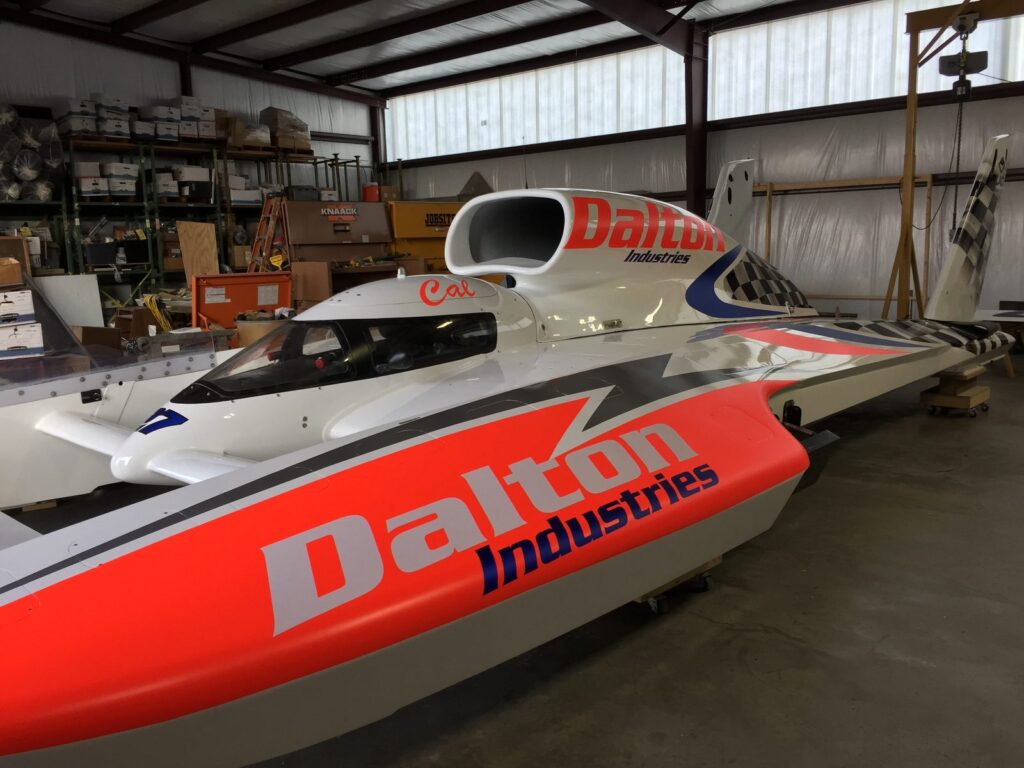 Professional U-27 Dalton Industries hydroplane racing boat vinyl wrap installation by Black Diamond Designs.