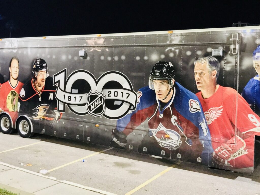 Full-length NHL Centennial 100th-anniversary commercial trailer wrap featuring hockey players from multiple eras