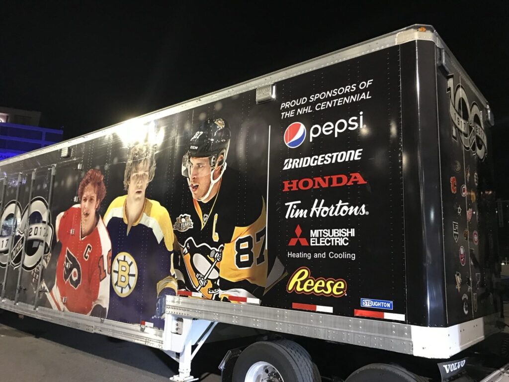 NHL Centennial semi-trailer graphics with historic hockey players and sponsor logos for Pepsi, Bridgestone, Honda, Tim Hortons, Mitsubishi Electric and Reese’s