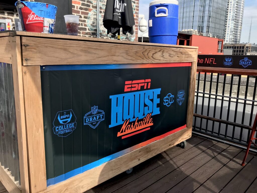 ESPN House Nashville rooftop bar front graphic with College Football, NFL Draft 2019, SportsCenter and Monday Night Football logos.