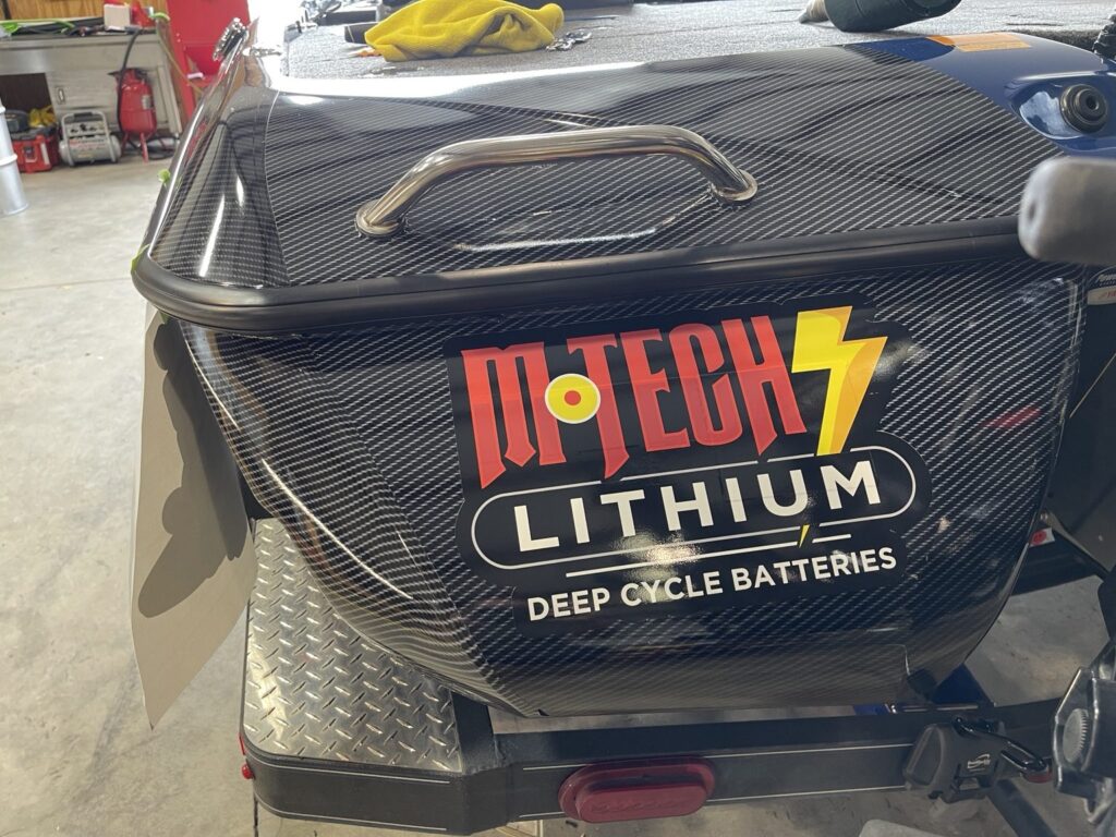 Branded rear panel on the wrapped Skeeter bass boat