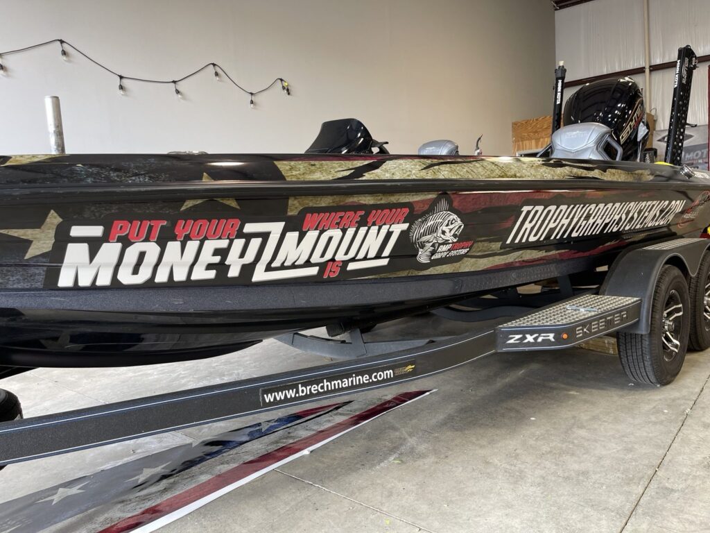 Bass boat hull wrap with weathered patriotic background and large white lettering