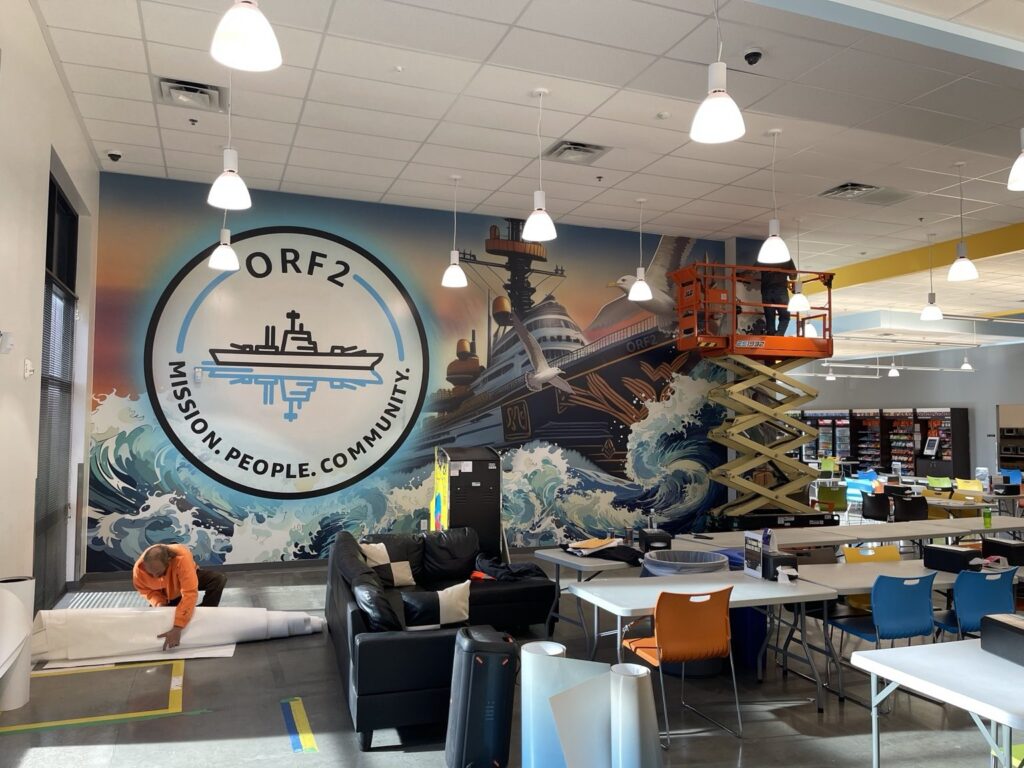 Installation in progress on the ORF2 maritime-themed interior wall mural