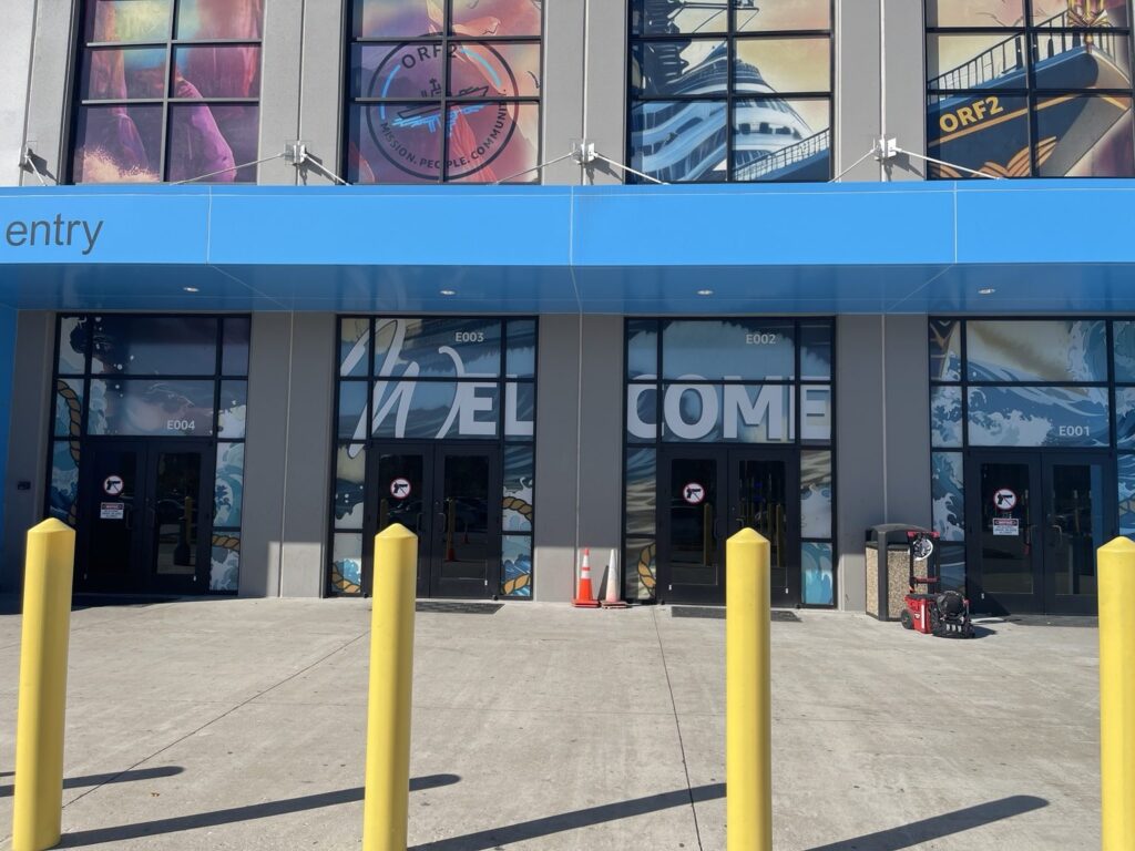 Amazon main entrance window graphics with large welcome lettering