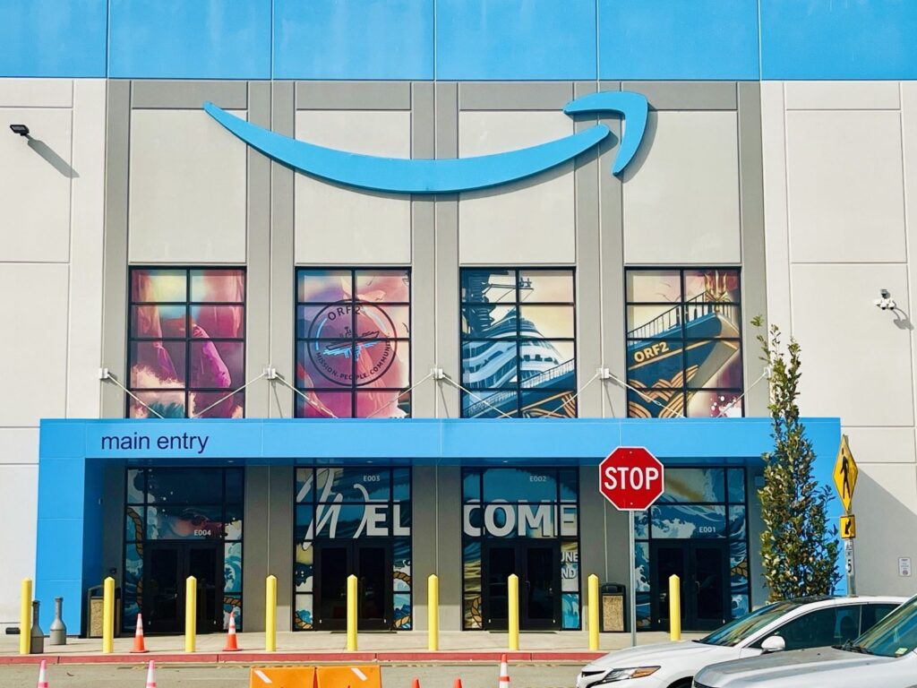 Chesapeake VA window graphics: Amazon facility entrance with window wraps and the Amazon sign