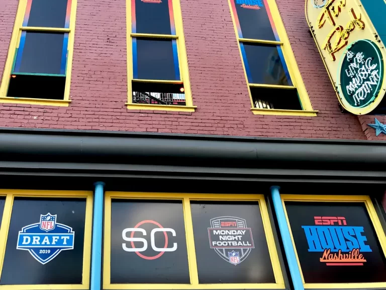 ESPN House and NFL Draft graphics on a brick building