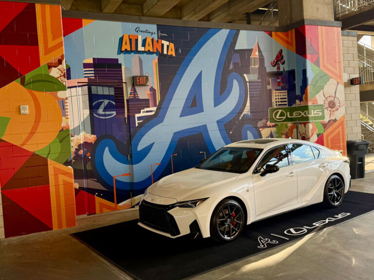 Atlanta Braves mural behind a white Lexus display vehicle