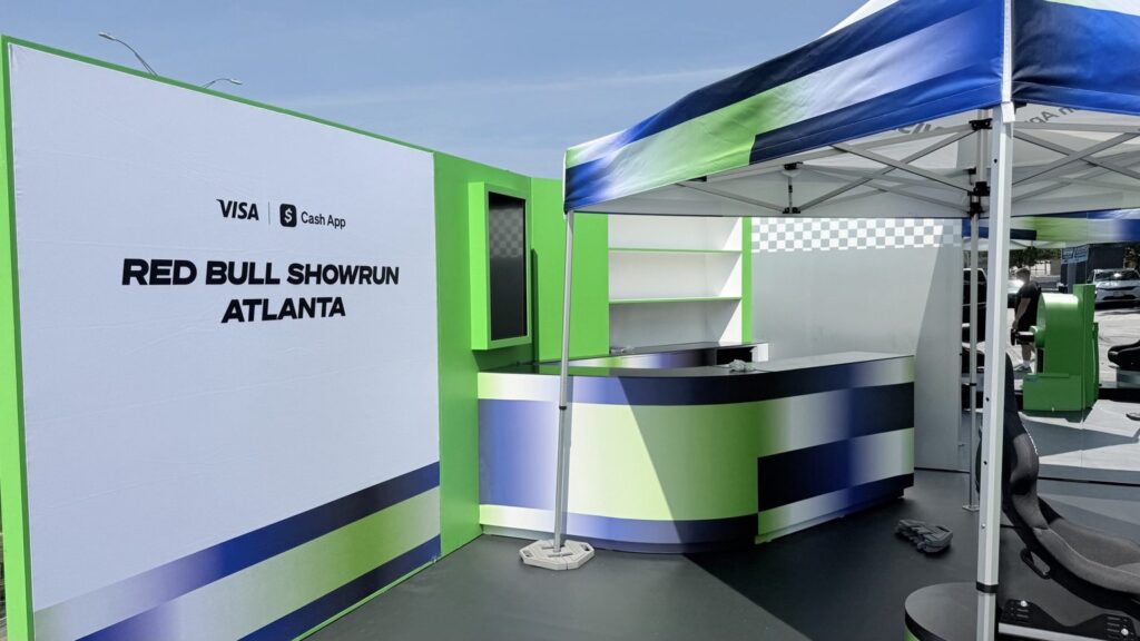 Branded booth with Visa, Cash App and Red Bull Showrun graphics in Atlanta