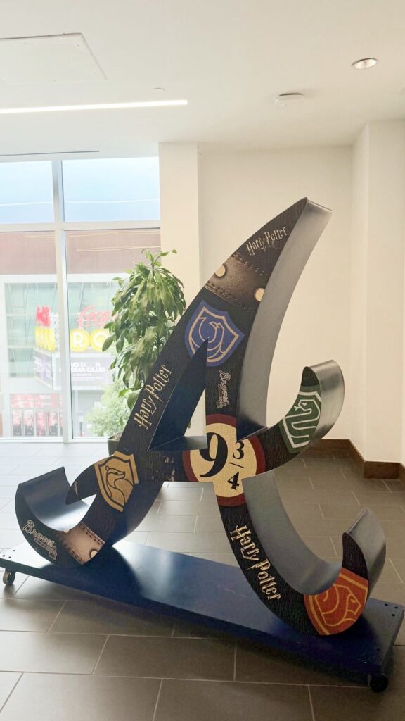 Full view of the six-foot-plus aluminum Braves logo with Harry Potter-themed vinyl graphics