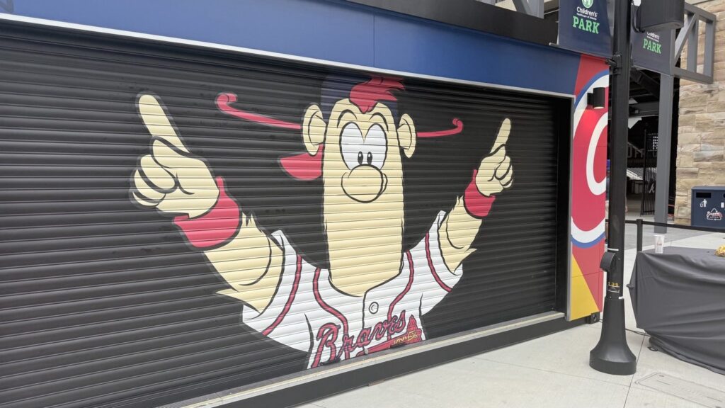Atlanta Braves Blooper roll-up door vinyl graphics installation by Black Diamond Designs.
