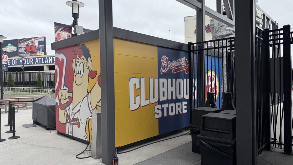 Atlanta Braves Clubhouse Store wrap featuring Blooper graphics at Truist Park.