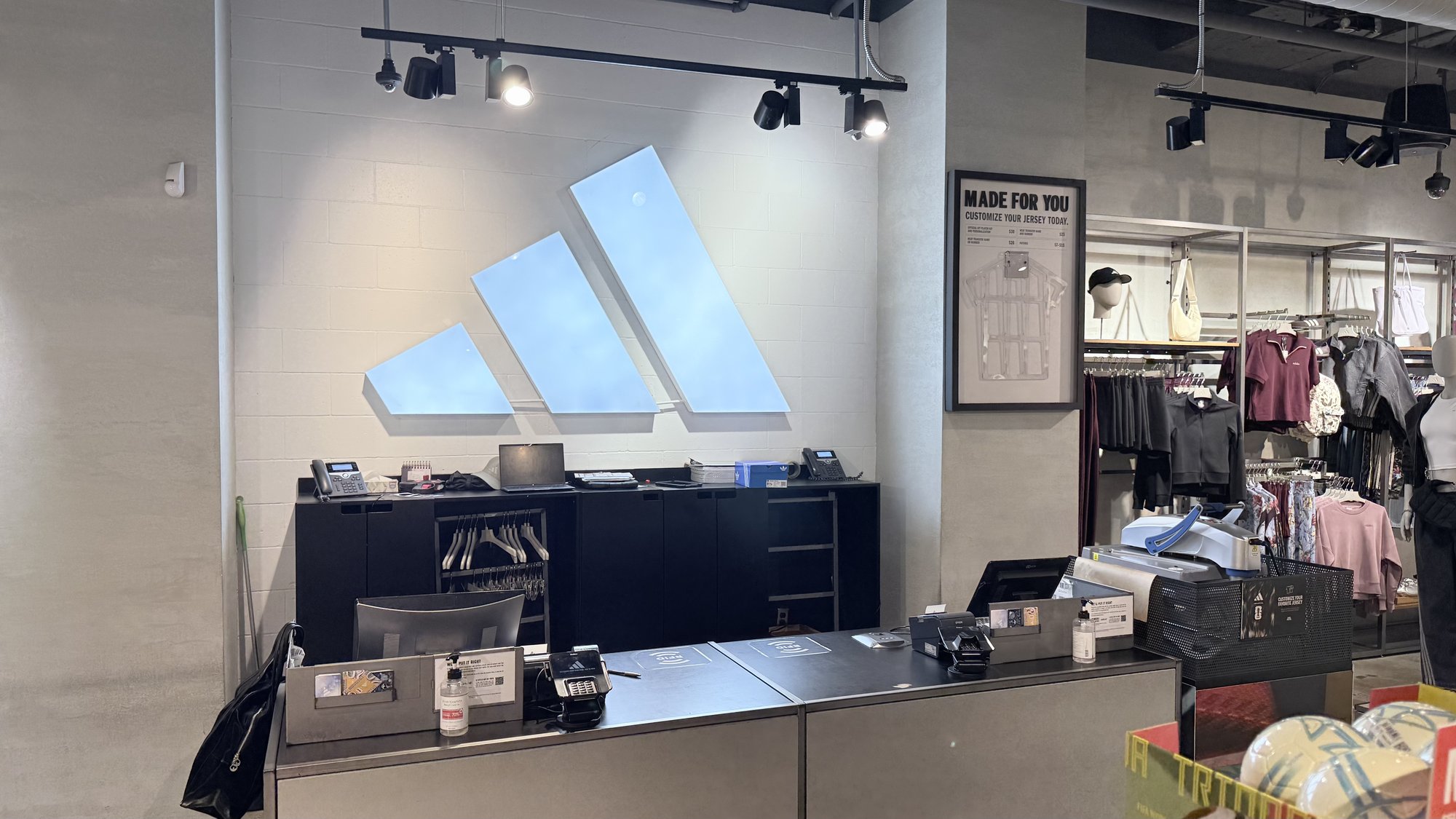 Adidas jersey frame graphics and retail display installation at Lenox Square Atlanta