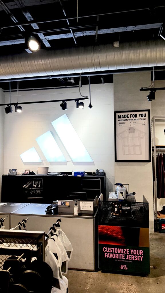 Adidas retail graphics installation at Lenox Square in Atlanta, GA by Black Diamond Designs
