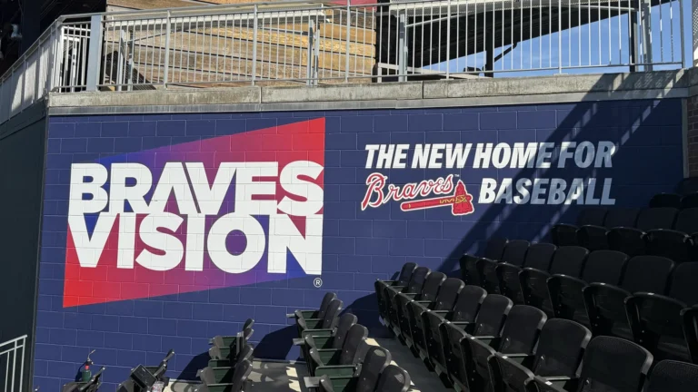 Concrete wall wrap Atlanta Braves Vision graphics installed at Truist Park with 3M vinyl graphic film and heat-rolling techniques by Black Diamond Designs.