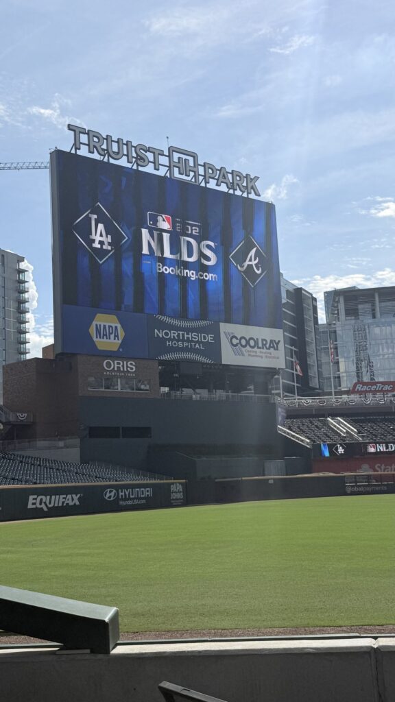 Truist Park video board showing the 2026 NLDS Dodgers vs. Braves matchup in Atlanta