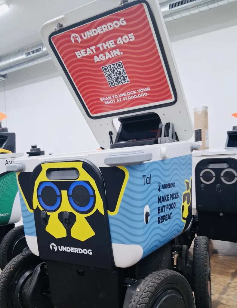 UNDERDOG robot lid graphic reading Beat the 405 Again, part of the delivery robot wrap.