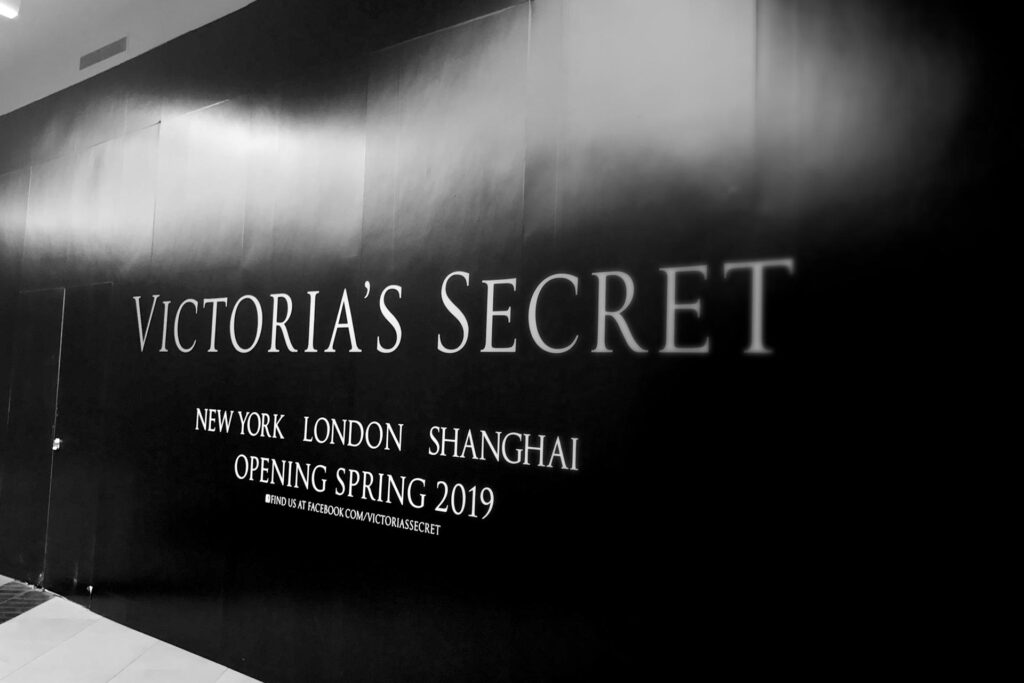 Retail barricade graphics installation Atlanta example: Victoria's Secret barricade wrap by Black Diamond Designs